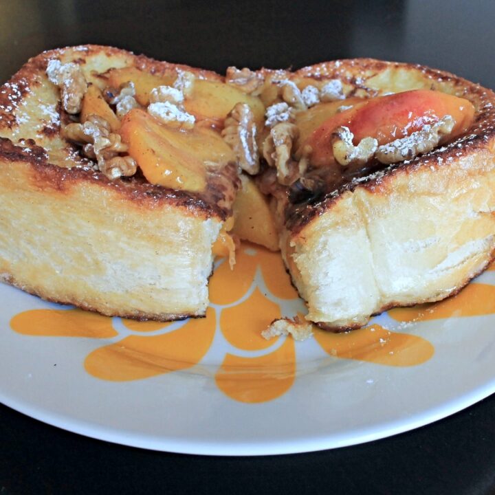 https://www.theoliveblogger.com/wp-content/uploads/2016/08/Peach-Stuffed-French-Toast-sliced-1-720x720.jpg