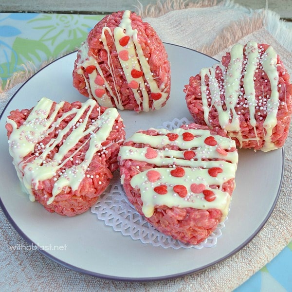 Heart shaped krispie squares on plate.