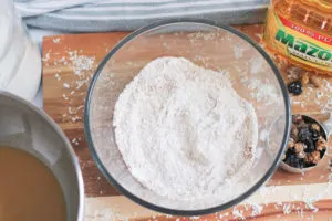 Dry ingredients for fruit muffin batter in large glass bowl