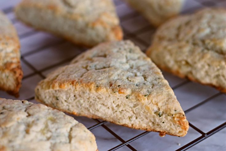 Cheese scones on wire cooling rack.