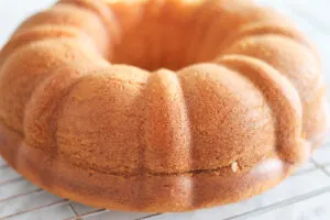 Lemon bundt cake on cooling rack.