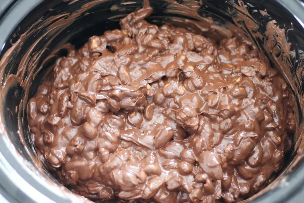 Finished melted nut clusters in slow cooker.